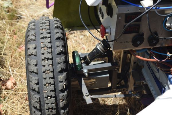 An accelerometer installed behind the wheel of an agricultural robot.