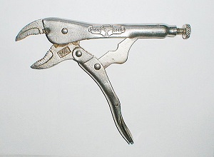 An opened pair of locking pliers.
