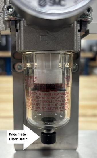 Pneumatic filter drain